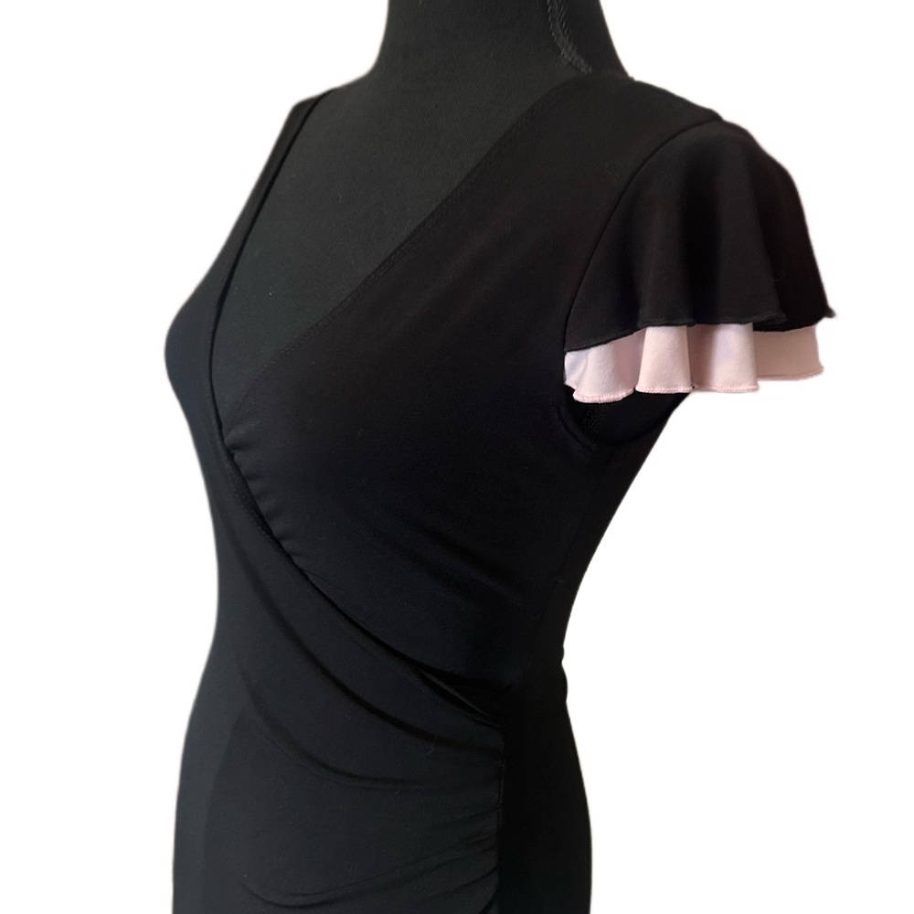Deep V ballerina stretch black dress with pink ruffles